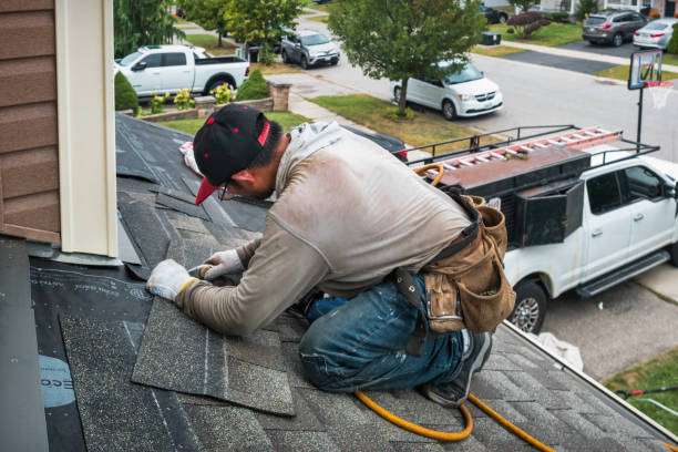 Professional Roofing technician working in Lewistown, IL